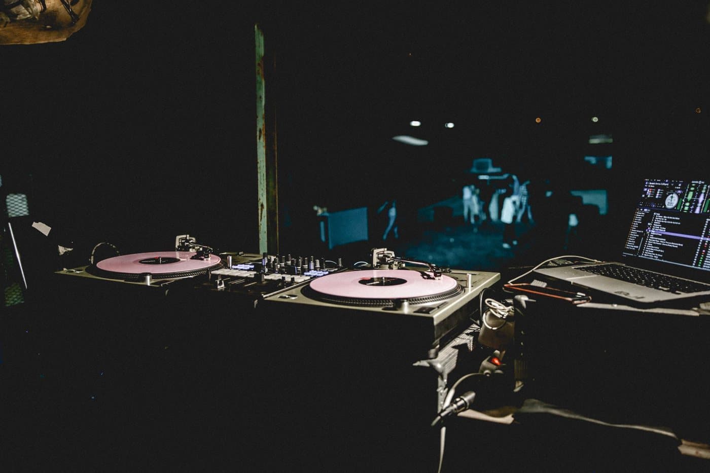 DJ turntables and mixer at an evening event